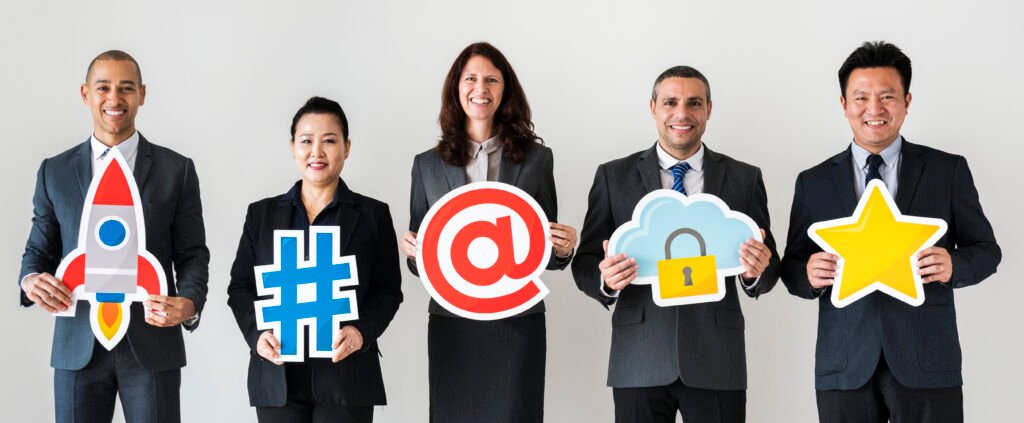 Business people standing and holding icons